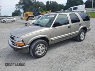 1999 Chevrolet Blazer LS with VIN 1GNDT13W7X2168500, listed as a Copart auction lot 70659475 with 130,002 mi miles and Salvage title. Bid and sale history available at DreamBid. Image 1.