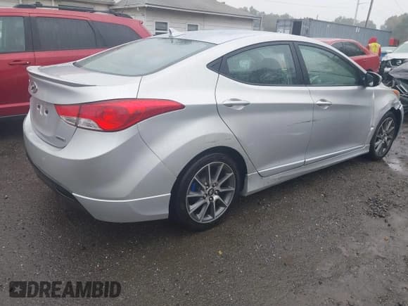 ✅ 2013 Hyundai Elantra GLS • VIN: KMHDH4AE1DU559210 • Lot: 43217612. Listed on IAAI with 106,194 mi. Free auction sales archive from the USA and detailed vehicle history report at DreamBid. Image 4.