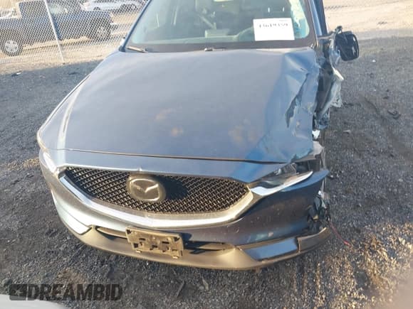 ✅ 2019 Mazda CX-5 Grand Touring Reserve • VIN: JM3KFBDYXK0568219 • Lot: 43619359. Listed on IAAI with 65,252 mi. Free auction sales archive from the USA and detailed vehicle history report at DreamBid. Image 13.