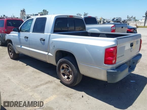 ✅ 2005 Dodge Dakota ST • VIN: 1D7HE28K15S288148 • Lot: 42883541. Wystawiony na IAAI z przebiegiem 259 379 mil. Bezpłatny archiwum sprzedaży aukcyjnych z USA i szczegółowy raport historii pojazdu na DreamBid. Zdjęcie 3.