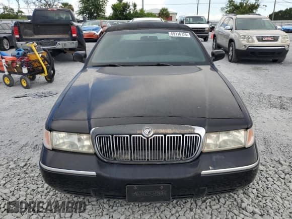 ✅ 2002 Mercury Grand Marquis GS • VIN: 2MEFM74W02X616001 • Lot: 69116725. Listed on Copart with 162,936 mi. Free auction sales archive from the USA and detailed vehicle history report at DreamBid. Image 5.