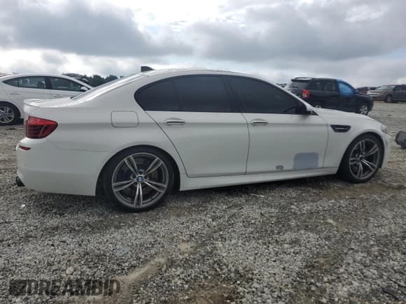 ✅ 2014 BMW M5 • VIN: WBSFV9C52ED097699 • Лот: 65842515. Опубликован ранее на Copart с пробегом 96 229 миль. Бесплатный доступ к архиву аукционных продаж из США и подробный отчёт об истории автомобиля на DreamBid. Изображение 3.