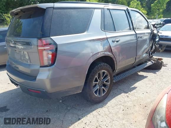 2022 Chevrolet Tahoe Z71 z VIN 1GNSKPKDXNR109801, wystawiony jako IAAI lot #42502286 z przebiegiem Nie podano mil oraz . Historia ofert i sprzedaży dostępna na DreamBid. Obrazek 4.