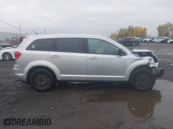 2012 Dodge Journey American Value with VIN 3C4PDCAB4CT154190, listed as a IAAI auction lot 43485900 with 161,305 mi miles and . Bid and sale history available at DreamBid. Image 13.