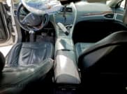 ✅ 2016 Lincoln MKZ • VIN: 3LN6L2J90GR630133 • Lot: 94142215. Wystawiony na Copart z przebiegiem 69 572 mil. Bezpłatny archiwum sprzedaży aukcyjnych z USA i szczegółowy raport historii pojazdu na DreamBid. Zdjęcie 8.