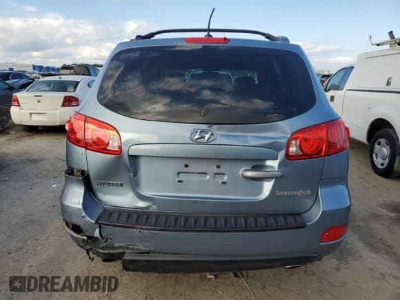 ✅ 2009 Hyundai Santa Fe Limited • VIN: 5NMSH13E09H321192 • Lot: 79897134. Listed on Copart with 209,319 mi. Free auction sales archive from the USA and detailed vehicle history report at DreamBid. Image 6.