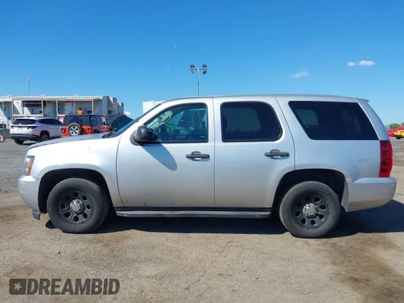 ✅ 2014 Chevrolet Tahoe Commercial • VIN: 1GNLC2E09ER207067 • Lot: 43268966. Listed on IAAI with 227,117 mi. Free auction sales archive from the USA and detailed vehicle history report at DreamBid. Image 14.