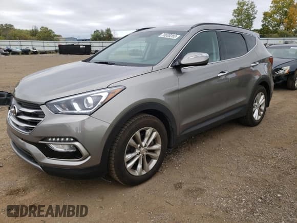 ✅ 2018 Hyundai Santa Fe Limited • VIN: 5XYZUDLA4JG549784 • Лот: 70005283. Опубликован ранее на Copart с пробегом 47 686 миль. Бесплатный доступ к архиву аукционных продаж из США и подробный отчёт об истории автомобиля на DreamBid. Изображение 1.