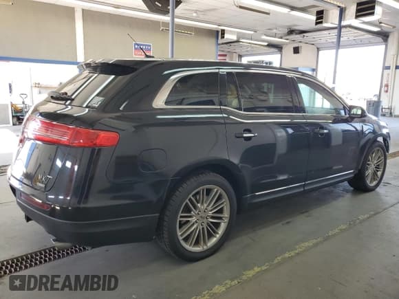 ✅ 2013 Lincoln MKT EcoBoost • VIN: 2LMHJ5AT7DBL58335 • Lot: 84251805. Listed on Copart with 165,951 mi. Free auction sales archive from the USA and detailed vehicle history report at DreamBid. Image 3.