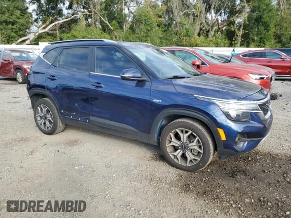 ✅ 2022 Kia Seltos EX • VIN: KNDERCAA2N7252951 • Lot: 86847355. Listed on Copart with 26,302 mi. Free auction sales archive from the USA and detailed vehicle history report at DreamBid. Image 4.