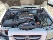 ✅ 1999 Suzuki Grand Vitara JLX • VIN: JS3TD62V6X4108432 • Lot: 71856914. Listed on Copart with 185,537 mi. Free auction sales archive from the USA and detailed vehicle history report at DreamBid. Image 12.