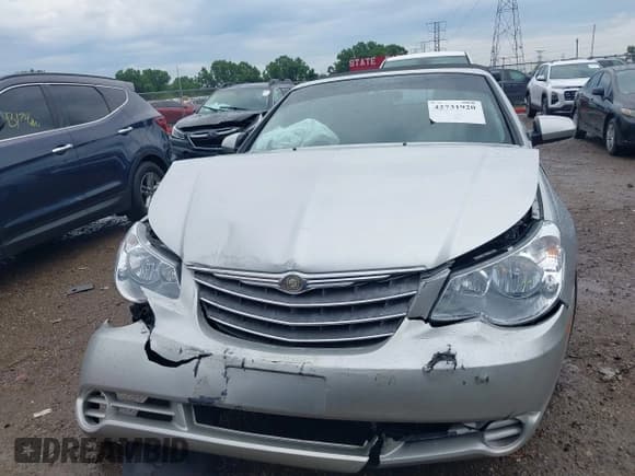 ✅ 2010 Chrysler Sebring Touring • VIN: 1C3BC5ED1AN153455 • Lot: 42731920. Listed on IAAI with 98,437 mi. Free auction sales archive from the USA and detailed vehicle history report at DreamBid. Image 12.