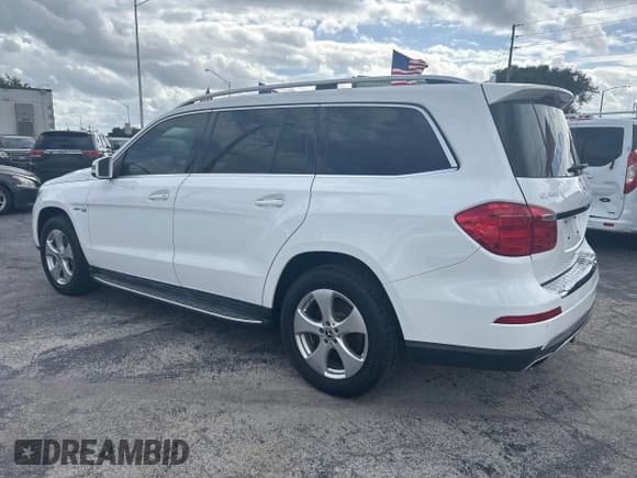 ✅ 2014 Mercedes-Benz GL 450 • VIN: 4JGDF7CE6EA287762 • Lot: 43636865. Listed on IAAI with 145,524 mi. Free auction sales archive from the USA and detailed vehicle history report at DreamBid. Image 6.