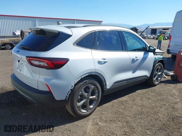✅ 2025 Ford Escape ST-Line • VIN: 1FMCU0MN0SUA10784 • Lot: 43294313. Listed on IAAI with 19,656 mi. Free auction sales archive from the USA and detailed vehicle history report at DreamBid. Image 4.