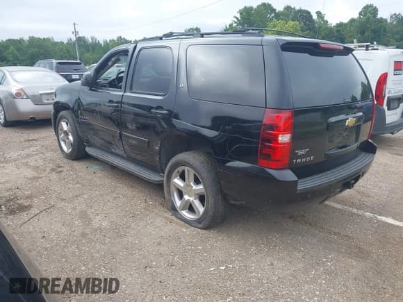 ✅ 2014 Chevrolet Tahoe LT • VIN: 1GNSCBE04ER141927 • Lot: 42651845. Listed on IAAI with 89,980 mi. Free auction sales archive from the USA and detailed vehicle history report at DreamBid. Image 3.