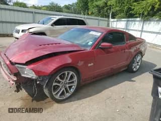 2014 Ford Mustang GT with VIN 1ZVBP8CF5E5301647, listed as a Copart auction lot 69274185 with 104,150 mi miles and Salvage title. Bid and sale history available at DreamBid. Image 1.