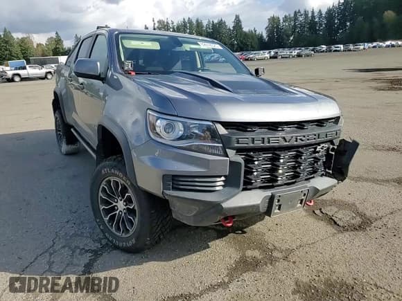 ✅ 2021 Chevrolet Colorado 4WD ZR2 • VIN: 1GCGTEEN4M1118897 • Lot: 82618525. Listed on Copart with 74,458 mi. Free auction sales archive from the USA and detailed vehicle history report at DreamBid. Image 14.