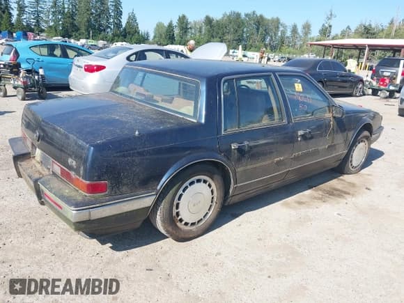 ✅ 1990 Cadillac Seville • VIN: 1G6KY5337LU818314 • Lot: 42807836. Listed on IAAI with 162,743 mi. Free auction sales archive from the USA and detailed vehicle history report at DreamBid. Image 4.