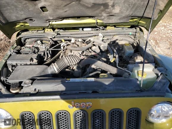 ✅ 2008 Jeep Wrangler Sahara • VIN: 1J4FA54148L567839 • Lot: 80106325. Listed on Copart with 136,706 mi. Free auction sales archive from the USA and detailed vehicle history report at DreamBid. Image 11.