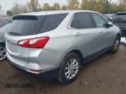 ✅ 2018 Chevrolet Equinox LT • VIN: 3GNAXSEV6JS545797 • Лот: 43521779. Опубликован ранее на IAAI с пробегом 135 278 миль. Бесплатный доступ к архиву аукционных продаж из США и подробный отчёт об истории автомобиля на DreamBid. Изображение 4.