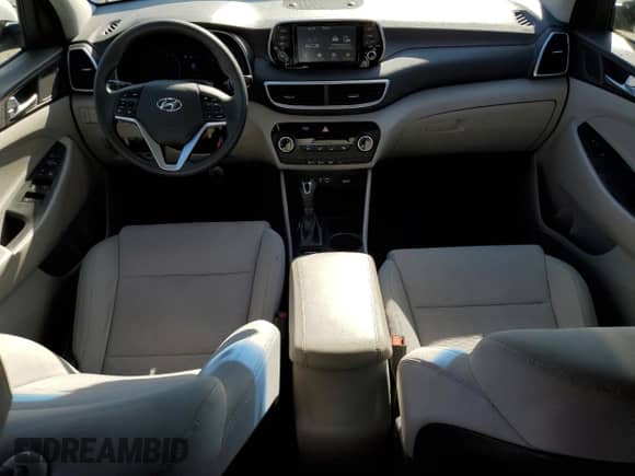 2019 Hyundai Tucson SE z VIN KM8J23A45KU869928, wystawiony jako Copart lot #87183485 z przebiegiem 42 648 mil mil oraz Szkoda całkowita • Salvage title. Historia ofert i sprzedaży dostępna na DreamBid. Obrazek 8.