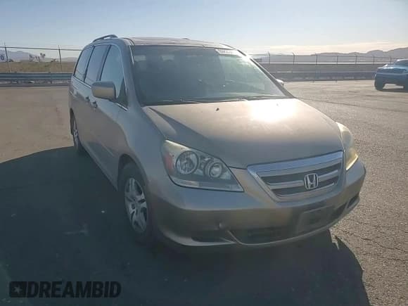 ✅ 2005 Honda Odyssey EX-L • VIN: 5FNRL38705B097212 • Лот: 92655085. Опубликован ранее на Copart с пробегом 162 776 миль. Бесплатный доступ к архиву аукционных продаж из США и подробный отчёт об истории автомобиля на DreamBid. Изображение 14.