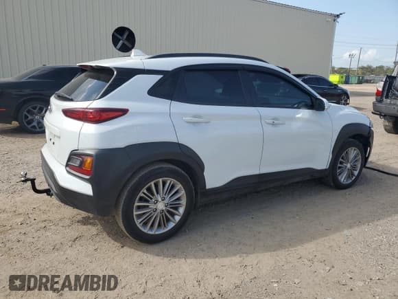 ✅ 2018 Hyundai Kona SEL • VIN: KM8K22AA1JU068318 • Лот: 63025814. Опубликован ранее на Copart с пробегом 103 336 миль. Бесплатный доступ к архиву аукционных продаж из США и подробный отчёт об истории автомобиля на DreamBid. Изображение 3.