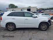 ✅ 2012 Kia Sorento SX • VIN: 5XYKW4A28CG243259 • Lot: 43555766. Listed on IAAI with 198,950 mi. Free auction sales archive from the USA and detailed vehicle history report at DreamBid. Image 13.