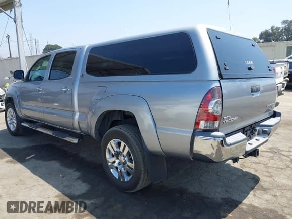 ✅ 2015 Toyota Tacoma PreRunner • VIN: 3TMKU4HN9FM045948 • Lot: 42575327. Listed on IAAI with 67,971 mi. Free auction sales archive from the USA and detailed vehicle history report at DreamBid. Image 3.