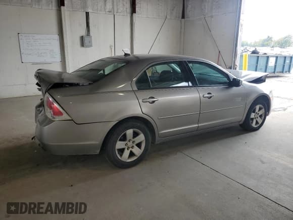 ✅ 2008 Ford Fusion SE • VIN: 3FAHP07148R123329 • Lot: 71637595. Listed on Copart with 124,614 mi. Free auction sales archive from the USA and detailed vehicle history report at DreamBid. Image 3.