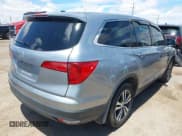 ✅ 2018 Honda Pilot EX-L • VIN: 5FNYF5H61JB008134 • Lot: 42193142. Listed on IAAI with 100,254 mi. Free auction sales archive from the USA and detailed vehicle history report at DreamBid. Image 4.