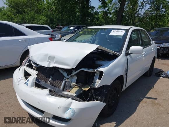 ✅ 2005 Mitsubishi Lancer ES • VIN: JA3AJ26EX5U031240 • Лот: 42464829. Опубликован ранее на IAAI с пробегом 196 239 миль. Бесплатный доступ к архиву аукционных продаж из США и подробный отчёт об истории автомобиля на DreamBid. Изображение 2.