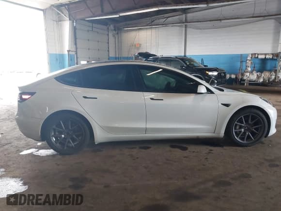 ✅ 2021 Tesla Model 3 Standard Range Plus • VIN: 5YJ3E1EA6MF009508 • Lot: 43296972. Listed on IAAI with 95,539 mi. Free auction sales archive from the USA and detailed vehicle history report at DreamBid. Image 13.
