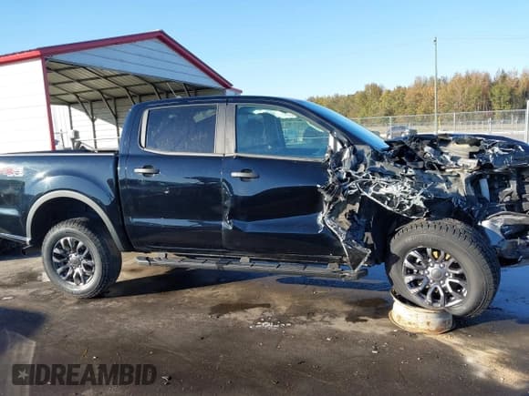 ✅ 2021 Ford Ranger XLT • VIN: 1FTER4FH0MLD89128 • Lot: 43580011. Listed on IAAI with 79,780 mi. Free auction sales archive from the USA and detailed vehicle history report at DreamBid. Image 13.