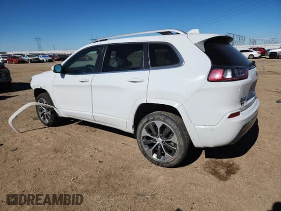 ✅ 2019 Jeep Cherokee Overland • VIN: 1C4PJMJNXKD142672 • Lot: 90723995. Listed on Copart with 85,288 mi. Free auction sales archive from the USA and detailed vehicle history report at DreamBid. Image 2.