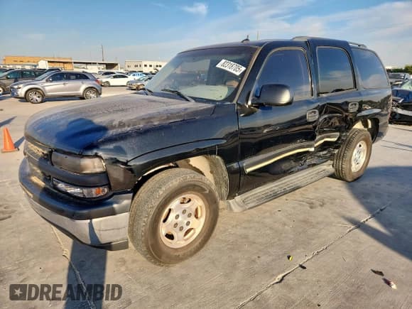 ✅ 2005 Chevrolet Tahoe LS • VIN: 1GNEC13V25R240252 • Lot: 82318705. Listed on Copart with 323,949 mi. Free auction sales archive from the USA and detailed vehicle history report at DreamBid. Image 1.