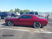 ✅ 2022 Dodge Challenger SXT • VIN: 2C3CDZGGXNH109629 • Lot: 41977454. Listed on IAAI with 64,946 mi. Free auction sales archive from the USA and detailed vehicle history report at DreamBid. Image 14.