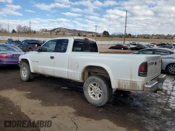 ✅ 2002 Dodge Dakota SLT • VIN: 1B7GG42N52S689177 • Lot: 42699345. Wystawiony na Copart z przebiegiem 167 471 mil. Bezpłatny archiwum sprzedaży aukcyjnych z USA i szczegółowy raport historii pojazdu na DreamBid. Zdjęcie 2.