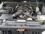 ✅ 2011 Jeep Wrangler Sahara • VIN: 1J4AA5D16BL517963 • Lot: 69210635. Listed on Copart with 171,839 mi. Free auction sales archive from the USA and detailed vehicle history report at DreamBid. Image 12.