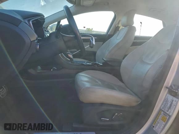 ✅ 2016 Ford Fusion Titanium Hybrid • VIN: 3FA6P0RU0GR127178 • Лот: 94665415. Опубликован ранее на Copart с пробегом 141 144 миль. Бесплатный доступ к архиву аукционных продаж из США и подробный отчёт об истории автомобиля на DreamBid. Изображение 7.