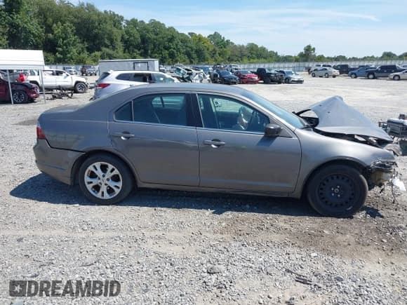 ✅ 2012 Ford Fusion SE • VIN: 3FAHP0HA1CR351408 • Lot: 43202440. Wystawiony na IAAI z przebiegiem 205 469 mil. Bezpłatny archiwum sprzedaży aukcyjnych z USA i szczegółowy raport historii pojazdu na DreamBid. Zdjęcie 14.