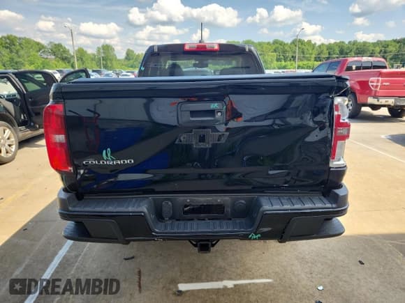 ✅ 2015 Chevrolet Colorado 2WD Z71 • VIN: 1GCHSCE31F1175037 • Лот: 61641745. Опубликован ранее на Copart с пробегом 93 310 миль. Бесплатный доступ к архиву аукционных продаж из США и подробный отчёт об истории автомобиля на DreamBid. Изображение 6.