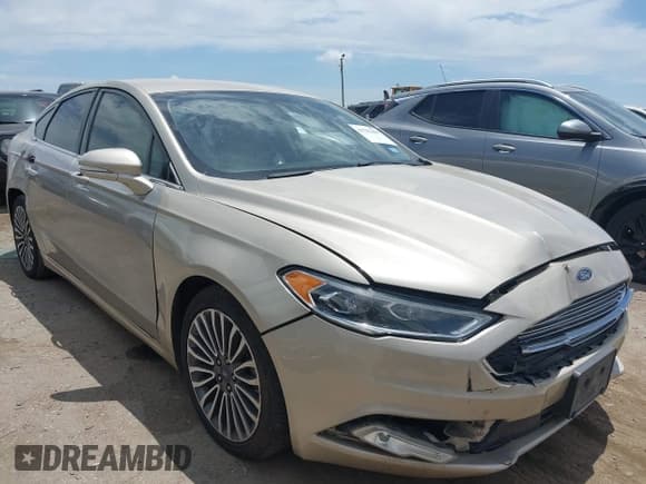 ✅ 2017 Ford Fusion Hybrid Titanium • VIN: 3FA6P0RU7HR388518 • Lot: 42783469. Listed on IAAI with 90,081 mi. Free auction sales archive from the USA and detailed vehicle history report at DreamBid. Image 1.
