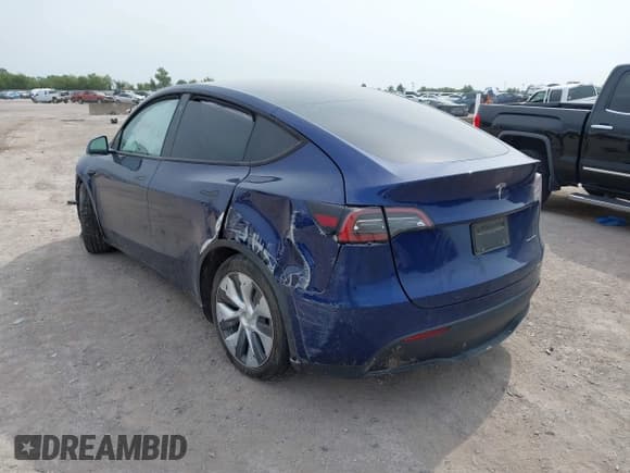 ✅ 2023 Tesla Model Y Long Range • VIN: 7SAYGDEE5PA076268 • Lot: 43140234. Wystawiony na IAAI z przebiegiem 26 918 mil. Bezpłatny archiwum sprzedaży aukcyjnych z USA i szczegółowy raport historii pojazdu na DreamBid. Zdjęcie 3.