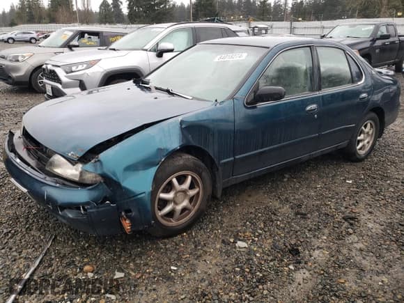 ✅ 1997 Nissan Altima XE • VIN: 1N4BU31D3VC222205 • Lot: 84018274. Listed on Copart with 261,349 mi. Free auction sales archive from the USA and detailed vehicle history report at DreamBid. Image 1.