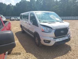 ✅ 2021 Ford Transit Passenger XL • VIN: 1FBAX2Y88MKA64890 • Lot: 43144341. Listed on IAAI with 129,139 mi. Free auction sales archive from the USA and detailed vehicle history report at DreamBid. Image 1.