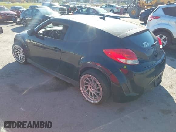 2013 Hyundai Veloster w/Black Int с VIN KMHTC6AD2DU092229, выставлен на аукционе IAAI как лот 43601459 с пробегом 191 710 миль миль и . История ставок и продаж доступна на DreamBid. Изображение 3.