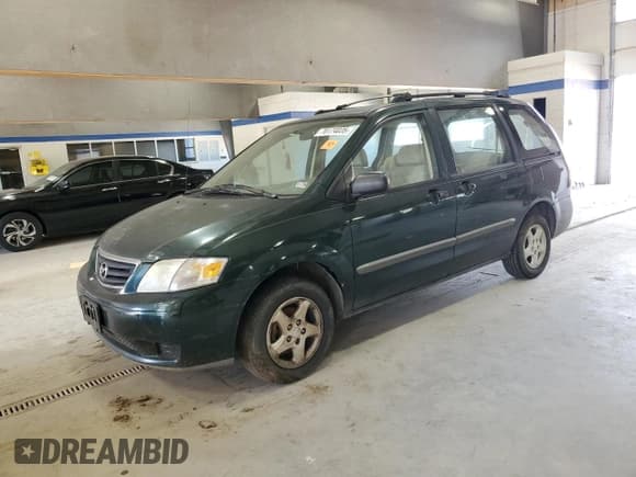 ✅ 2001 Mazda MPV DX • VIN: JM3LW28G310194704 • Lot: 70174035. Listed on Copart with 101,451 mi. Free auction sales archive from the USA and detailed vehicle history report at DreamBid. Image 1.