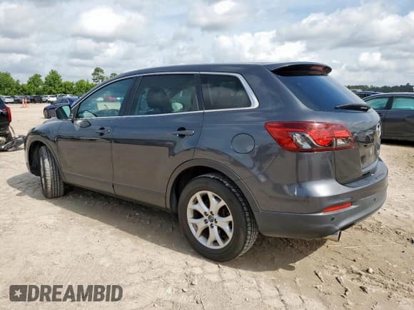 ✅ 2015 Mazda CX-9 Touring • VIN: JM3TB3CA7F0450628 • Lot: 60561465. Listed on Copart with 137,919 mi. Free auction sales archive from the USA and detailed vehicle history report at DreamBid. Image 2.