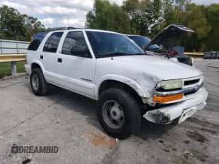 2003 Chevrolet Blazer LS z VIN 1GNDT13X13K179026, wystawiony jako Copart lot #71979684 z przebiegiem 213 519 mil mil oraz Szkoda całkowita • Salvage title. Historia ofert i sprzedaży dostępna na DreamBid. Obrazek 4.